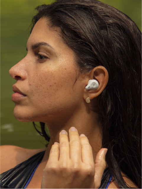 Model Wearing Mifo O5 Touch White Earbuds 